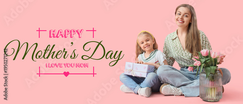 Cute little girl greeting her mom for Mother's Day with gift box and tulips while sitting on pink background
