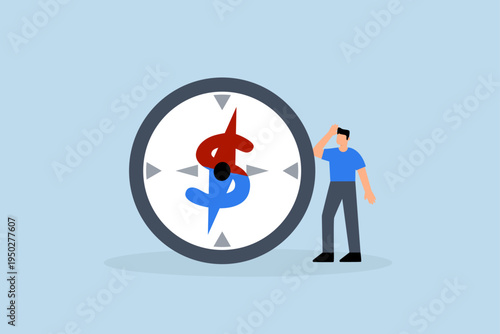 Economic direction or investment trend, Businessman investor examining compass pointing towards dollar sign direction