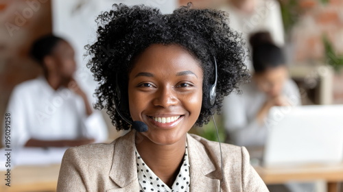 Customer service representative answers calls in a busy call center during working hours