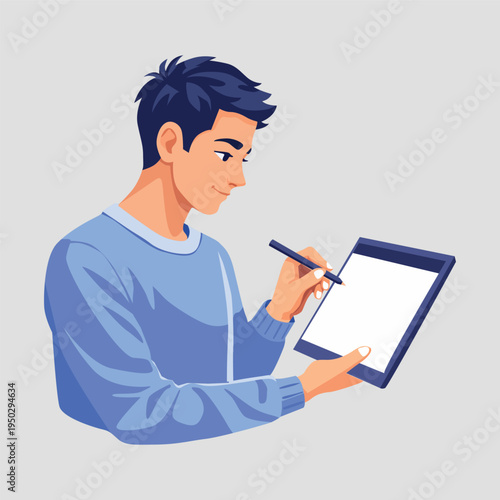 A young man using a digital tablet and stylus for creative work or communication