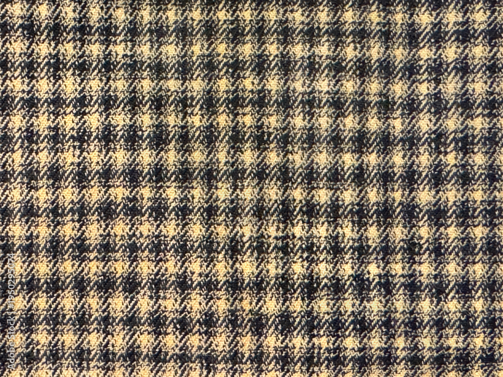 Fototapeta premium Close up of fabric with tartan pattern. In brown and white color. Flannel or tartan style is very common in scarf, shirts, and fashion industry. Seamless background texture.