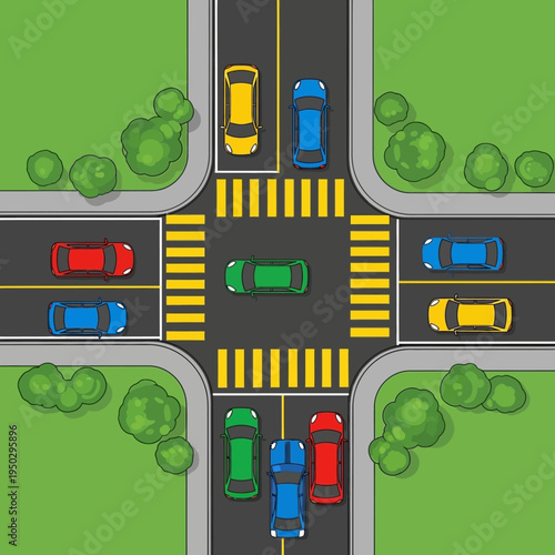 Busy intersection with cars waiting at traffic lights, crosswalks, and green spaces
