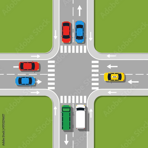 Busy intersection with cars at traffic lights, top-down view