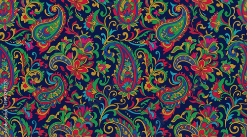 Vibrant and intricate paisley pattern with colorful floral and swirling vine motifs on a dark blue background, showcasing traditional textile design.