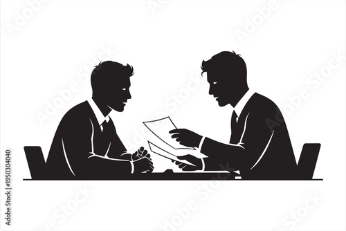 Two businessmen discussing documents in a meeting
