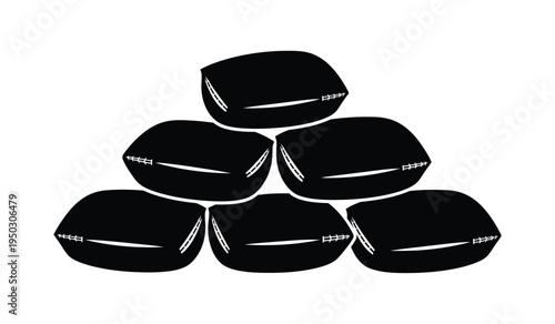 A stacked pile of sturdy black sandbags arranged in a pyramid formation for flood protection use