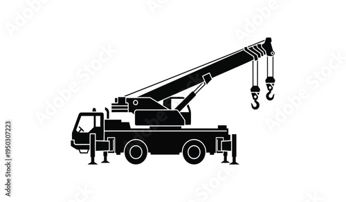A detailed black silhouette icon of a heavy duty mobile construction crane for industrial projects