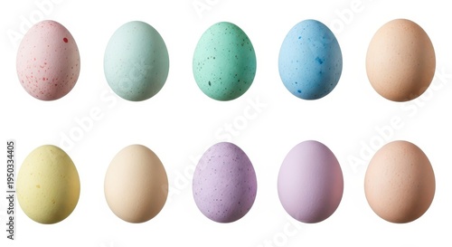 A collection of ten colorful speckled easter eggs isolated against a plain white background surface