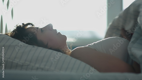 Slika na platnu brunette woman puts her head on a pillow, woman did all the work and go to bed a