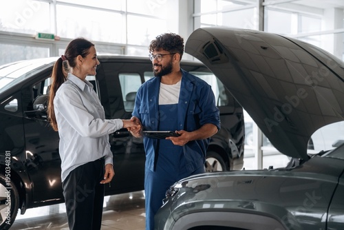Technical inspection explained to customer indoors