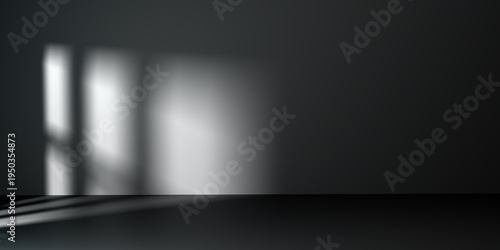 Tableau sur toile Dark minimalist empty room with black wall and floor featuring soft window light shadow