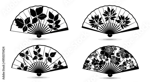 Set of Four Black and White Decorative Folding Fans with Floral and Leaf Patterns