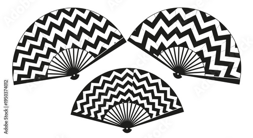 Three Black and White Chevron Pattern Folding Fans Arranged Artistically