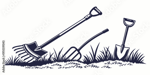 A variety of gardening tools resting on a patch of grass