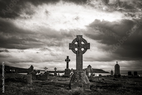 Black and white, Creepy old grave crosses with cloudy sky, Dingle Peninsula, Kerry, Ireland