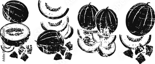 Fresh whole and sliced melons with scattered cubes on white background