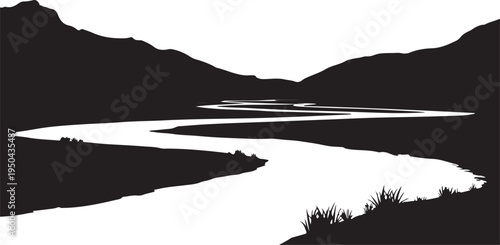 Silhouette of a winding river flowing through mountains
