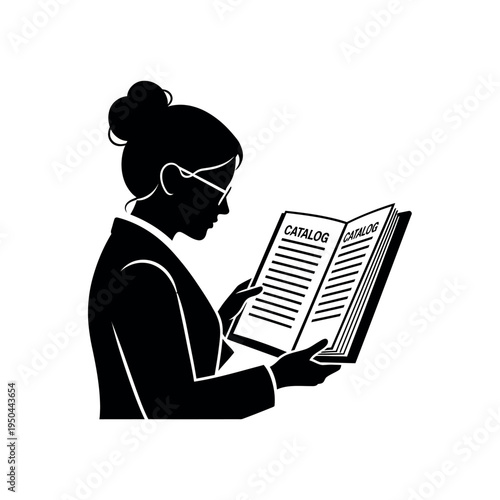 Silhouette of a woman with glasses reading a catalog book.