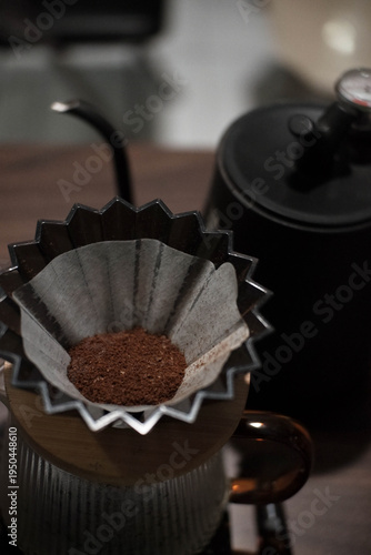 Ground coffee beans on the dripper, ready to brew v60 filter coffee