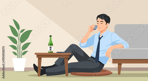 Man relaxing at home drinking sake from a bottle and cup, seated on floor