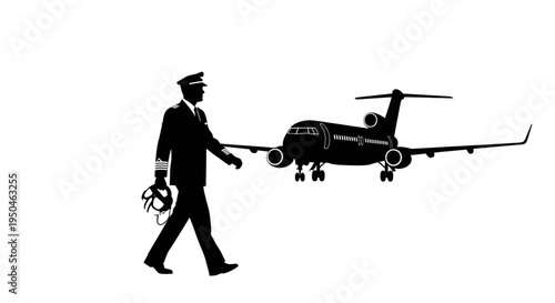 Silhouette of a commercial airline pilot walking in front of a jet airplane at an airport