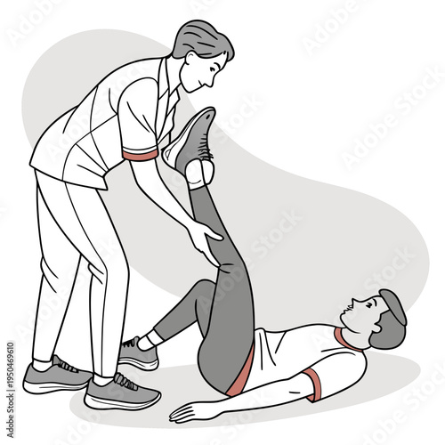 A physical therapist assisting a patient with a leg stretch exercise on the floor