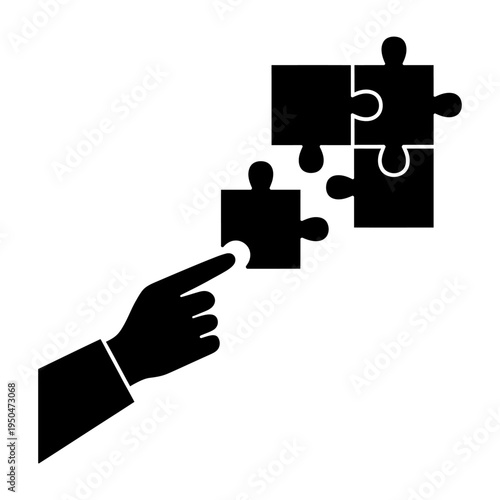 Vector representation of a hand placing a jigsaw puzzle piece into its correct position