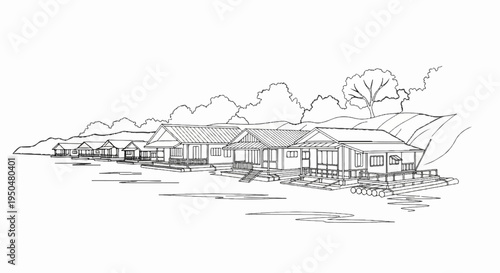 Row of simple houses on stilts near a calm body of water, with hills and trees