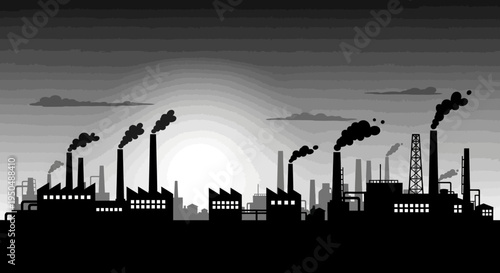 Industrial silhouette with factories and smoke stacks against a sunrise