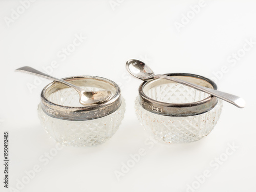 Usk Monmouthshire Wales UK March 16 2026 pair of antique Edwardian british cut glass sterling silver rimmed salts with solid silver spoons