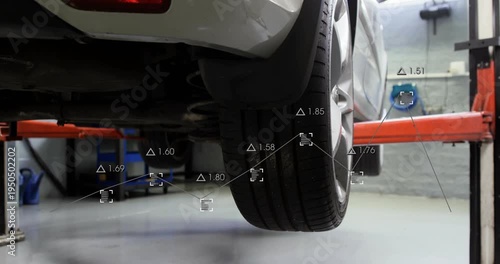 Rear right wheel dropping as lift arm moving, automotive data overlays updating alignment readings