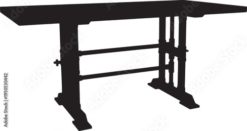 Silhouette of a table with ornate legs and metal frame