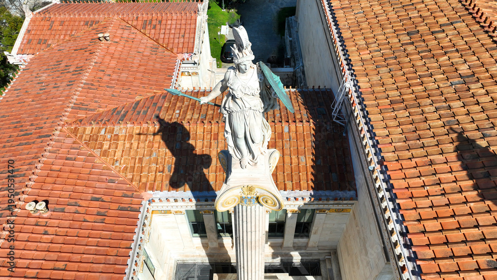 Fototapeta premium Aerial drone photo of historic Neoclassic building of Academy of Athens featuring statue of goddess Athena in Acadimias street, Attica, Greece