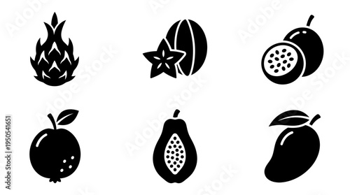 A vibrant assortment of tropical fruits including pineapple, starfruit, and papaya on white background