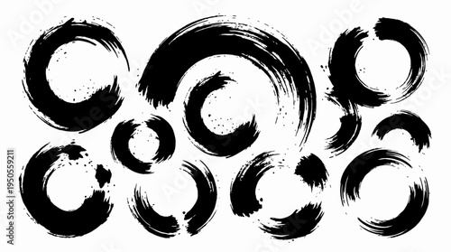 Abstract black ink brush strokes forming circular patterns on a white background, suitable for design