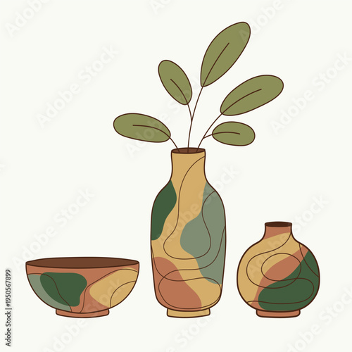 A tall abstract patterned vase with branches and a small bowl.