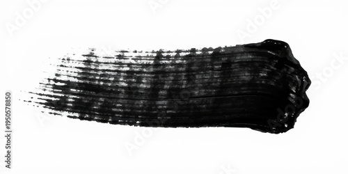 Minimalist abstract black ink brush stroke, wide horizontal paint smear, rough textured edges, dry brush effect, grunge paint streak isolated on a clean white background, high contrast, modern design.