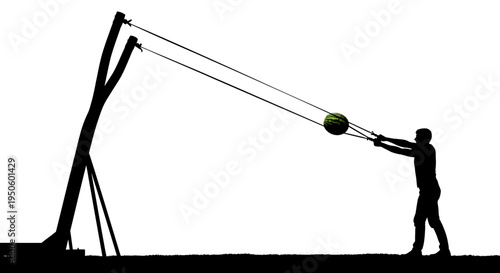 Man operating large mechanical throwing device.