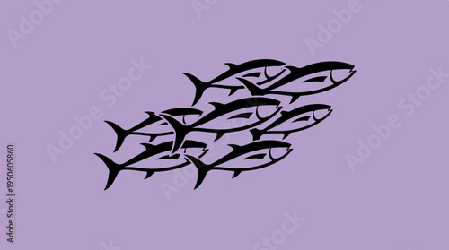 A dynamic school of fish swimming together in a cohesive group.