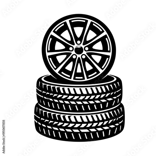 Automotive display featuring a car wheel with rim resting on two stacked tires, representing industry and service