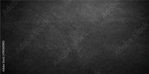 A dark, textured surface, the rugged and enigmatic background for a variety of creative concepts, inviting imagination.