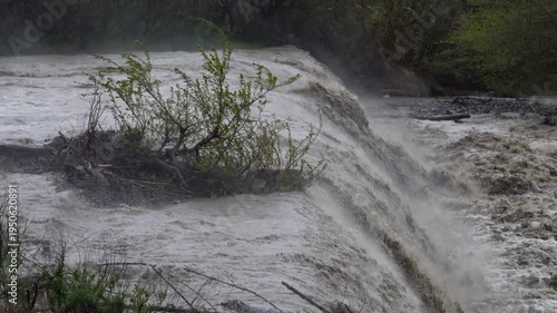 Wallpaper Mural Mountain runoff and river flooding. Large volumes of mountain water are flooding riverbeds in southern Italy. Extreme weather conditions are causing widespread soil erosion and active landslides. Torontodigital.ca