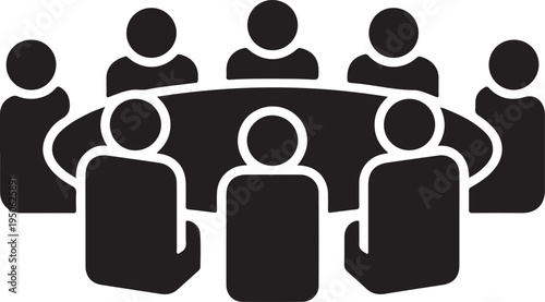 Group of people gathered around a conference table in a meeting setting