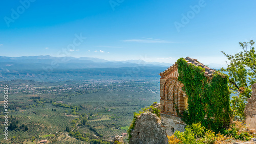 Panoramic view of ruins in Mystras archeological site with valley and Sparta below, Laconia, Peloponnese, Greece