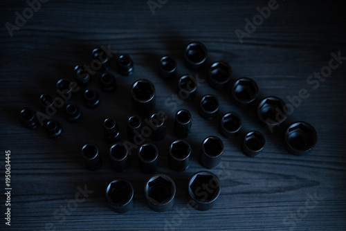 Canvastavla High-performance impact sockets dominate the foreground, showcasing their precision 6-point (hexagonal) broaching and heavy-duty side walls