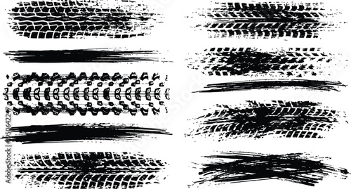 Set of black grunge tire tracks and brush strokes isolated on transparent background