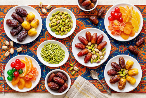 Wallpaper Mural Colorful dates pistachios and candied fruits flat lay arrangement Torontodigital.ca