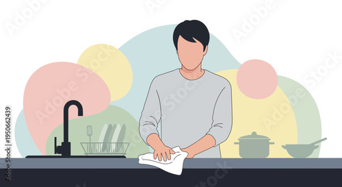 Man drying hands with a white towel after washing dishes.