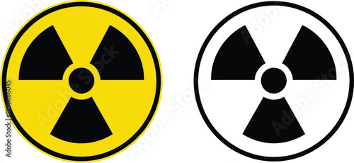 Two circular radiation warning symbols shown in both yellow and black and white color variations Vector