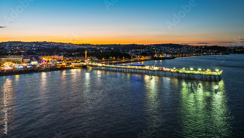 Принти на полотні Night view of Paignton Pier and Beach from a drone, Paignton, Devon, England, Eu